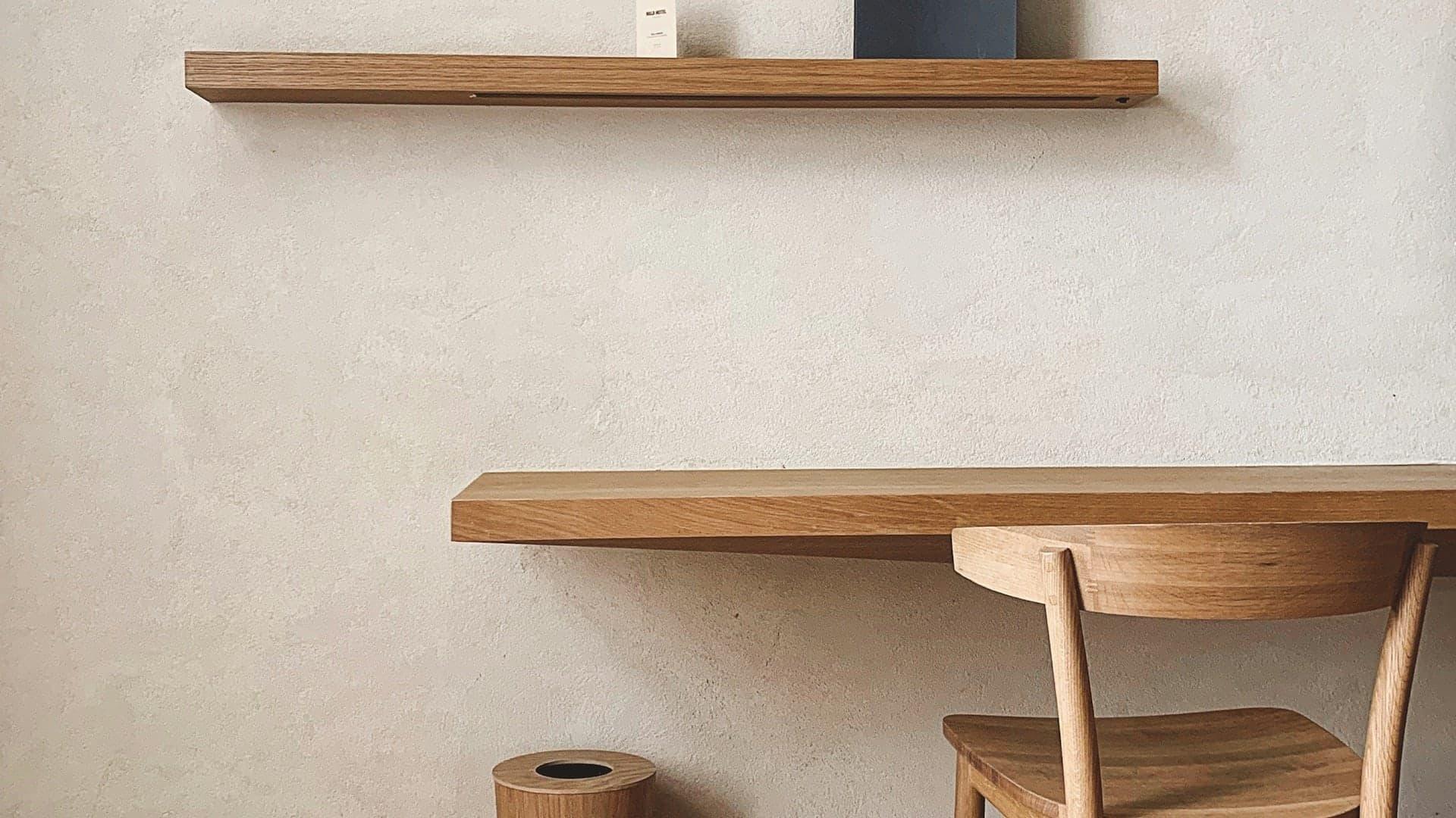 Minimalist wood workspace with floating desk, shelf and chair